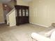 Welcoming living space featuring elegant furniture and a classic china cabinet at 7650 Red Mill Cir, New Port Richey, FL 34653