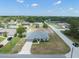 Beautiful single-story home with a large driveway and well-manicured lawn in a quiet neighborhood at 8199 Nordica Rd, Weeki Wachee, FL 34613