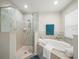 Elegant bathroom features a shower, garden tub, and neutral tile throughout at 8199 Nordica Rd, Weeki Wachee, FL 34613