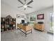 Bright and inviting office features a wooden desk, shelving, and ample natural light at 8199 Nordica Rd, Weeki Wachee, FL 34613