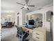 Open-concept living area with a home office nook, adjacent to the dining area and living spaces at 8199 Nordica Rd, Weeki Wachee, FL 34613