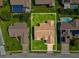 An aerial view of the home showcasing the roof and spacious backyard at 8401 Pavilion Dr, Hudson, FL 34667