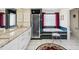 Bathroom featuring double vanity, shower, and soaking tub with decorative tile at 8401 Pavilion Dr, Hudson, FL 34667