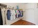 Walk-in closet featuring shelving and hanging storage for organization at 8401 Pavilion Dr, Hudson, FL 34667