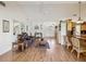 Spacious living room features vaulted ceilings, wood floors and ample natural light at 8401 Pavilion Dr, Hudson, FL 34667