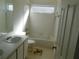Full bathroom with sink, tub, and shower featuring bright natural light at 846 Burlwood St, Brandon, FL 33511