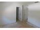 Spacious bedroom featuring bare floors, neutral paint, and two closets awaiting personalization at 846 Burlwood St, Brandon, FL 33511