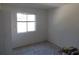 Spare bedroom with blank walls, window with natural light, and carpet flooring at 846 Burlwood St, Brandon, FL 33511
