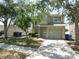Two-story home with a two-car garage and mature shade trees at 846 Burlwood St, Brandon, FL 33511