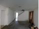 Open living area with stairs, blank white walls, carpet flooring, and natural light at 846 Burlwood St, Brandon, FL 33511