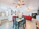 Open-concept dining area, flowing to other living spaces, with access to the outdoor patio at 8979 Hernando Way, Weeki Wachee, FL 34613