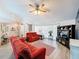 Open living room with tile floors, comfortable seating, and stylish décor at 8979 Hernando Way, Weeki Wachee, FL 34613