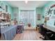 Bright office space with built-in desk, natural light, and ample room for creative work at 8979 Hernando Way, Weeki Wachee, FL 34613