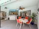 Enjoy this covered outdoor patio complete with an outdoor kitchen/bar and dining set at 8979 Hernando Way, Weeki Wachee, FL 34613