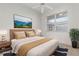 Staged bedroom with a large window and a picturesque view of the waterfront at 9149 Penelope Dr, Weeki Wachee, FL 34613