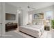 Virtually staged main bedroom featuring a luxe bed, TV, and modern decor at 9149 Penelope Dr, Weeki Wachee, FL 34613