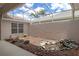 A screened-in patio featuring a rock garden and a view of the backyard at 9149 Penelope Dr, Weeki Wachee, FL 34613