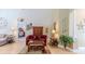 Spacious living room featuring hardwood floors, comfortable seating, and a cozy atmosphere at 9406 Burnam Dr, Weeki Wachee, FL 34613