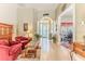 Open-concept living area with hardwood floors, comfortable seating, and stylish furnishings at 9406 Burnam Dr, Weeki Wachee, FL 34613