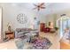 Bright and airy living room with high ceilings and a comfortable seating area at 9406 Burnam Dr, Weeki Wachee, FL 34613