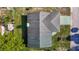 Aerial view of a house featuring a roof and surrounding landscape at 9425 Sterling Ln, Port Richey, FL 34668