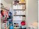 Organized closet with ample storage space and shelving, perfect for efficient organization at 9425 Sterling Ln, Port Richey, FL 34668