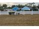 The community center with a white fence at 9474 Nakoma Way # E, Weeki Wachee, FL 34613