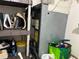HVAC system located in storage area with shelves and various items at 9474 Nakoma Way # E, Weeki Wachee, FL 34613
