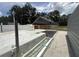 Spacious backyard featuring a patio, covered area, landscaping, and fencing at 10654 Holgate St, New Port Richey, FL 34654
