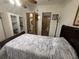 Bedroom with access to the bathroom and closet for added convenience at 10654 Holgate St, New Port Richey, FL 34654