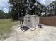 Outdoor storage shed with electrical connection at 10654 Holgate St, New Port Richey, FL 34654