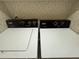 Close up of the modern washer and dryer with easy to use controls at 10654 Holgate St, New Port Richey, FL 34654