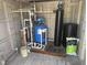 Interior view of the well water system in the storage shed at 10654 Holgate St, New Port Richey, FL 34654