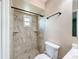 Bathroom features tile shower with a window at 11094 Auburndale St, Spring Hill, FL 34609