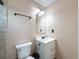 Bathroom featuring a stand up shower, standard toilet, and a white vanity at 11094 Auburndale St, Spring Hill, FL 34609