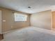 Lovely single-story home with neatly landscaped front yard and attached garage; features warm exterior colors at 11094 Auburndale St, Spring Hill, FL 34609