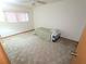 Bedroom with a window and carpet flooring at 11263 Murraysville Dr, Spring Hill, FL 34609