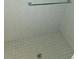 Clean and functional tiled shower with a standard showerhead at 11263 Murraysville Dr, Spring Hill, FL 34609