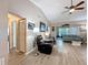 Comfortable living room featuring modern decor, hardwood floors, and a relaxing atmosphere at 11622 White Ash Dr, New Port Richey, FL 34654