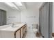 Cozy bathroom featuring a shower and tub combo, vanity and great light at 11725 Spring Tree Ln, Port Richey, FL 34668