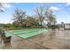 Well-maintained shuffleboard courts providing an opportunity for leisurely outdoor activity and social gatherings at 11725 Spring Tree Ln, Port Richey, FL 34668