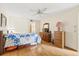 Bright bedroom with laminate flooring and ample space for furniture at 12141 Spartan Way # 102, Hudson, FL 34667
