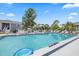Large community pool featuring lots of space for swimming and relaxing at 12141 Spartan Way # 102, Hudson, FL 34667