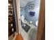 Cozy half bathroom with blue painted walls and decorative accents at 13651 Forest Lake Dr, Largo, FL 33771