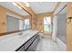 This bathroom features a single sink vanity, toilet and a shower-tub combination at 14178 Pullman Dr, Spring Hill, FL 34609