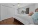 This bedroom has laminate floors, a ceiling fan and direct access to the pool area at 14178 Pullman Dr, Spring Hill, FL 34609