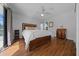 The bedroom features laminate floors, a ceiling fan and dresser at 14178 Pullman Dr, Spring Hill, FL 34609