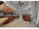 Spacious kitchen with granite countertops, stainless steel appliances, and ample wood cabinetry at 14178 Pullman Dr, Spring Hill, FL 34609