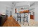 Living room with an eat-in kitchen and a bar with seating at 14178 Pullman Dr, Spring Hill, FL 34609