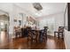 Cozy dining room with a modern chandelier, shuttered windows, and ample natural light at 1478 Brigadier Dr, Spring Hill, FL 34608